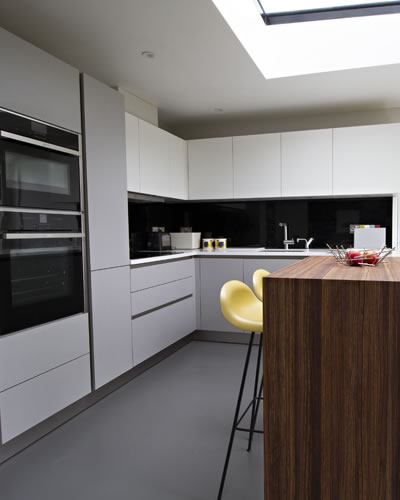 Kitchen with white cupboards