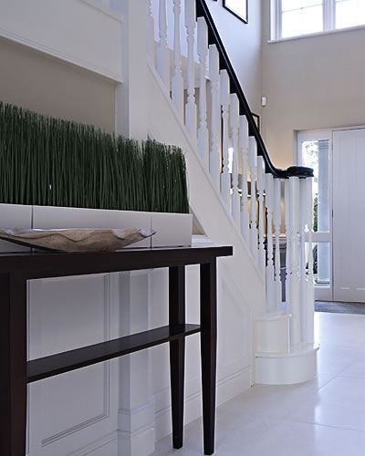 Entrance hall table and bannister